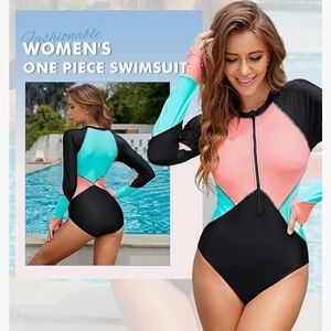 Blue pink and black swim suit one piece